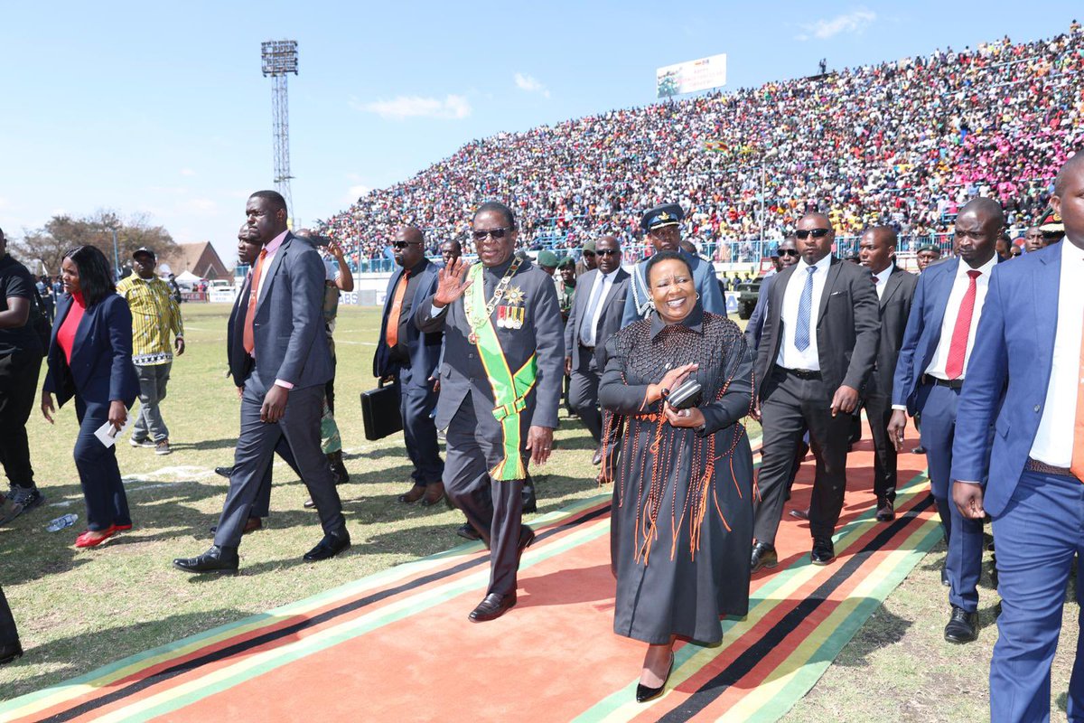 H.E. President <a href="/edmnangagwa/">President of Zimbabwe</a>, accompanied by H.E. the First Lady of Zimbabwe, <a href="/ZimFirstLady/">First Lady of Zimbabwe 🇿🇼</a>, arrives at Rufaro Stadium for the Defence Forces Day celebrations.