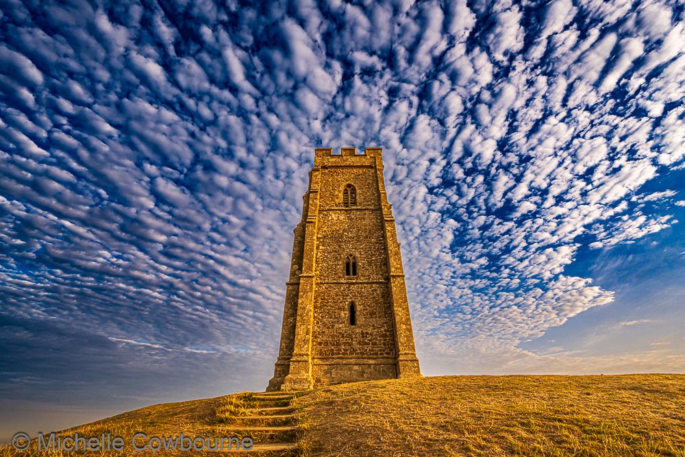 Glastomichelle's tweet photo. I know it's warm out there but St Michael's tower looks like it is fanning itself today. https://t.co/ECFQIxTCSP