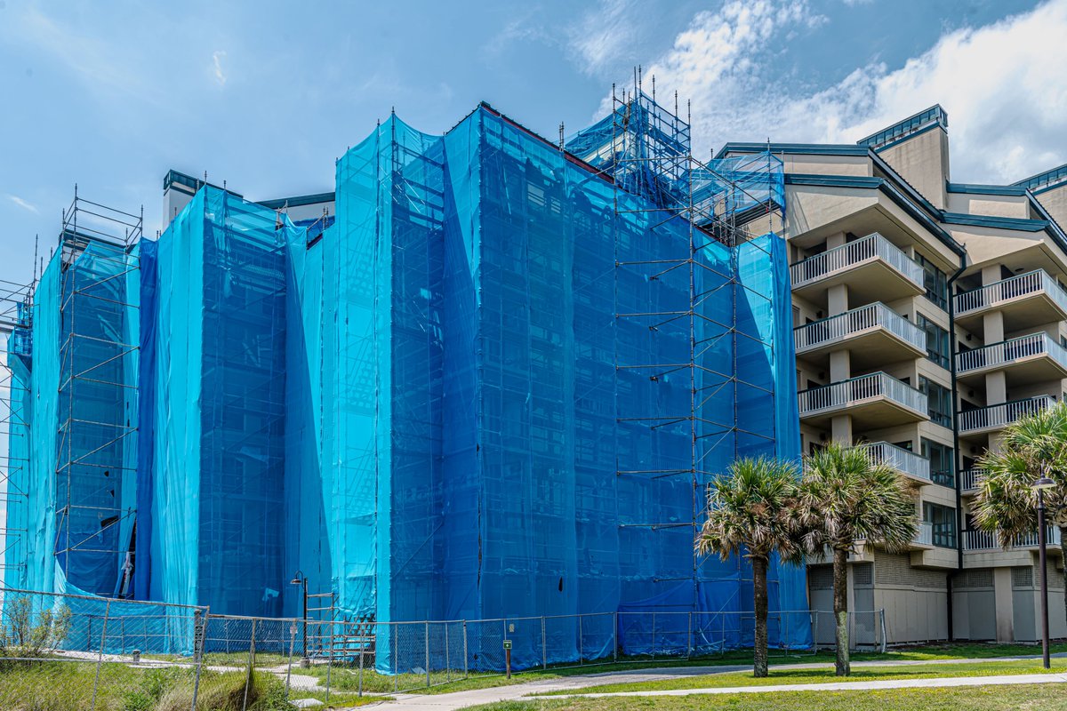 HillCon's tweet photo. Construction with a view! Progress is well underway on Buildings 1 &amp; 4 at the Ocean Club in Wild Dunes on the Isle of Palms. The project scope includes replacing exterior walls, roofs, &amp; windows, along with balcony repairs to enhance both durability &amp; aesthetics. https://t.co/hIrp3laAau