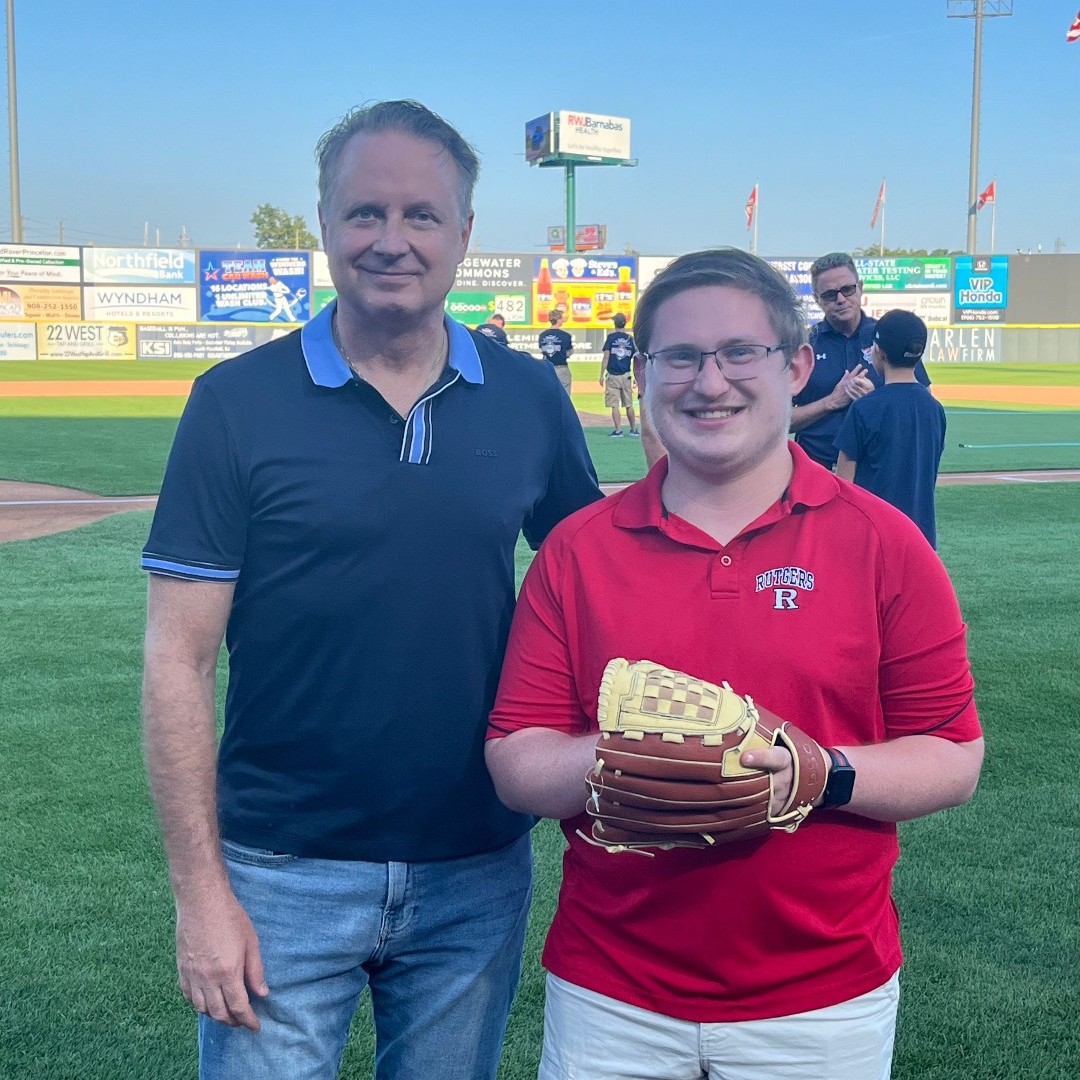 RWJUH's tweet image. An unforgettable night at the @SOMPatriots game! #CancerSurvivor Sam D. threw the first pitch with @DrAEvens by his side—just months after a stage 4 Hodgkin lymphoma diagnosis. Today, he’s in remission and cancer free! @RutgersCancer @RWJBarnabas #JackandSherylMorrisCancerCenter