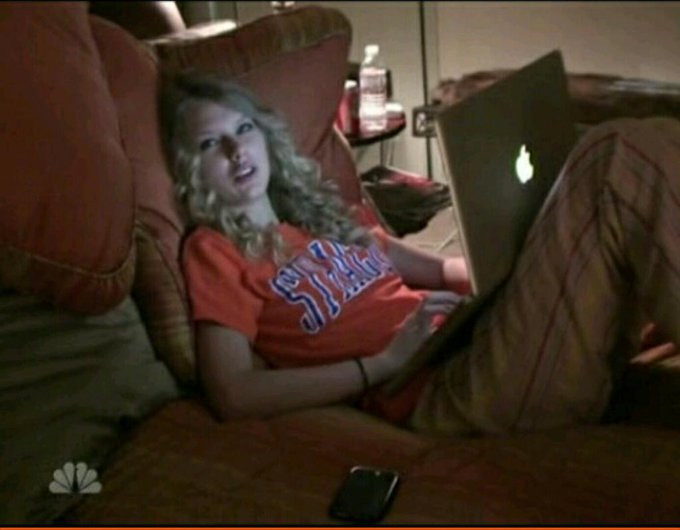 SUAlums's tweet photo. Syracuse grad POV: We’ve always known Orange is the greatest color, and now the world is catching up. 🧡
👀 We see you, Taylor—in your Orange tee in 2009 &amp; lighting up the Empire State Building overnight! 
The Life of a Showgirl Era looks very SYRACUSE, and we’re here for it. 🍊 https://t.co/nTQyioseAm