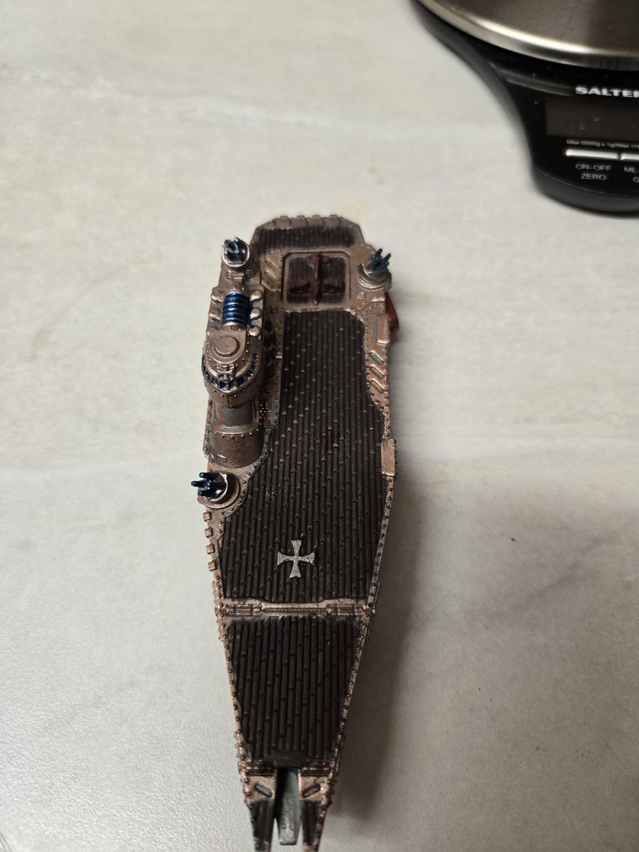 Dravreth's tweet image. Finished painting my first dystopian wars ship, the Templehoff fleet carrier im not good at this but I like colours ive used.