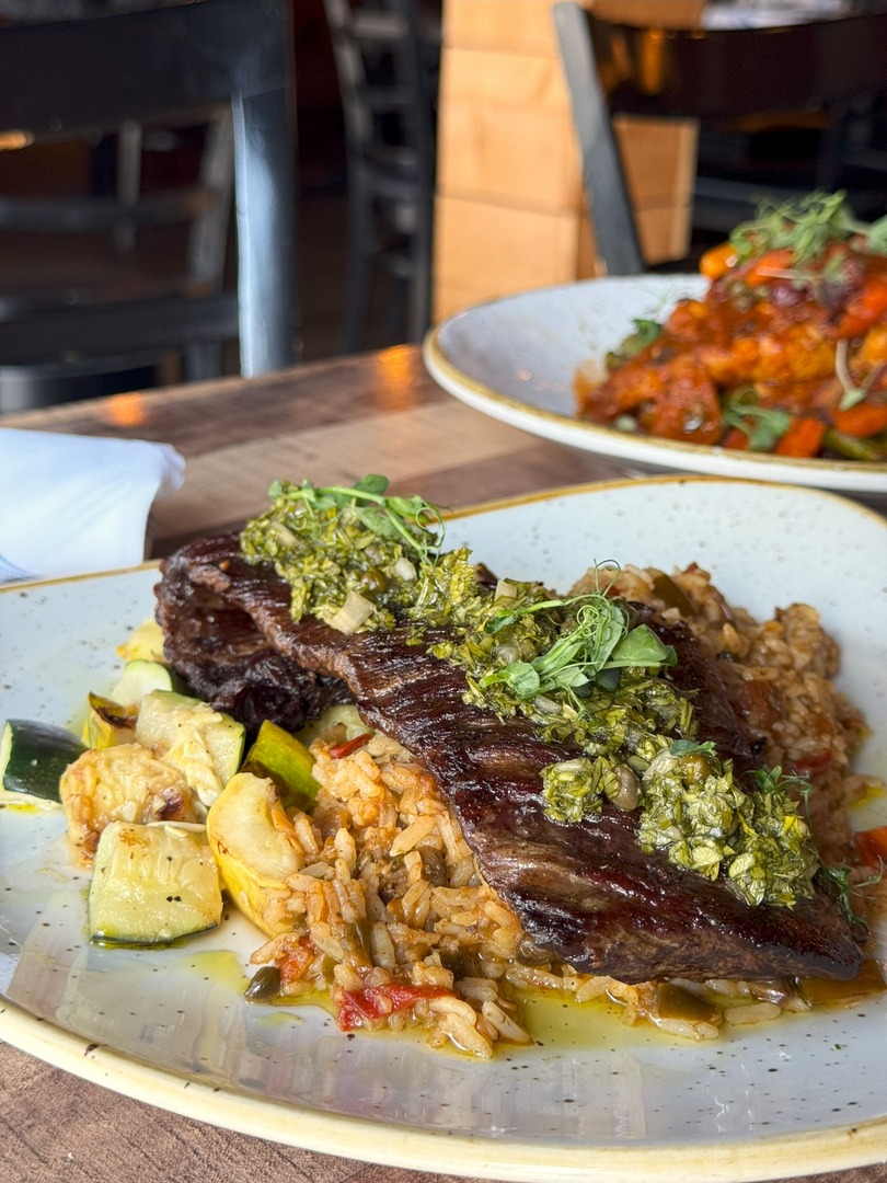 🤤Our 10oz skirt steak topped with parsley chimichurri sauce and served over a summer vegetable medley and sofrito rice. YUM! 

b2bistro.com/red-bank-menus…

*Friday 8/15, stop by the bar at 6pm to meet the founders of Lost Lore Tequila.🥃