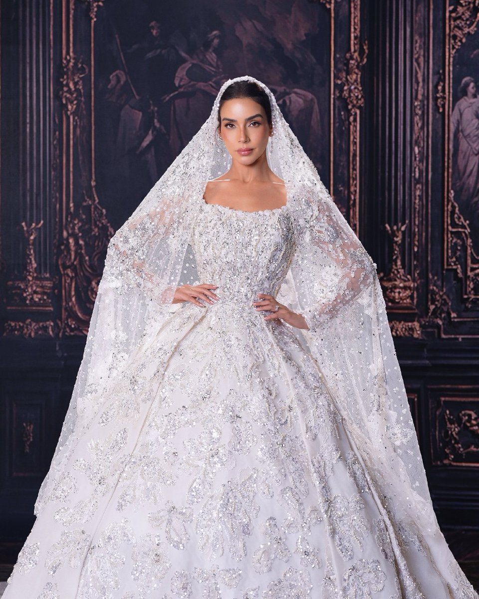 manalajaj's tweet photo. Silver florals flow across every layer of this gown, catching the light with quiet elegance. A piece made for moments that last—She Blooms Anyway. https://t.co/JuZUqVmZiw