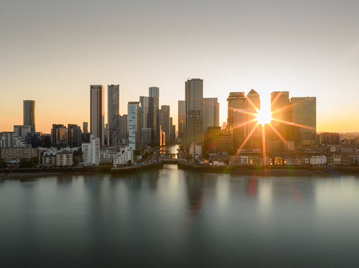 know it's not to everyone's taste but I love capturing the suns starburst through corridors of buildings or trees.  Employed the amazing stability of the Mavic 4 Pro's gimbal to capture many, many shots to create a long exposure effect on the water. <a href="/CanaryWharfLive/">Canary Wharf News</a> <a href="/DJIGlobal/">DJI</a>