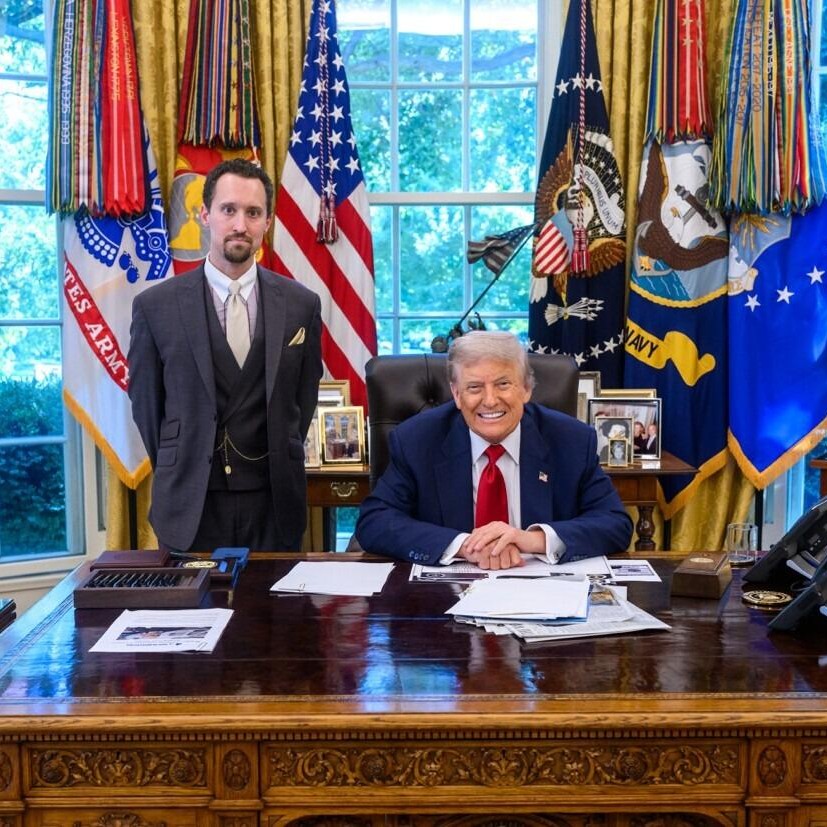 Experts have noticed that Trump's new head of labor statistics appears to have a Nazi ship hanging behind him in his office.