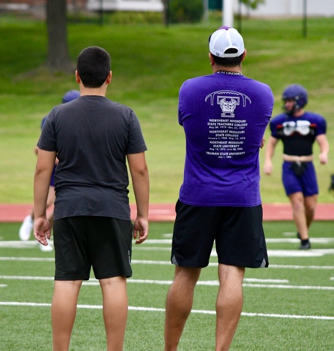 Youngest grandson, Bryce a 6th grader helping his dad at Truman State practice this morning!!