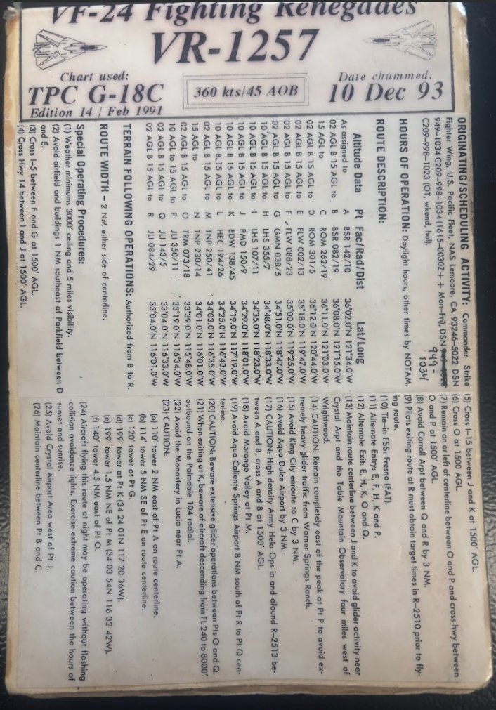 RSE_VB's tweet photo. #TomcatTails Number 36
#TomcatTuesday

“On time, on target means exactly what it says.”

Time means many different things to people. Some folks are fairly loose with their definition of “on time”, others are more focused on it. In the military there’s an old adage that “if you’re 5 minutes early, you’re 10 minutes late.” And within the military, particularly among the more tactical operators, the words “on time” have a very specific meaning. They mean “ON TIME”. If a specific action is supposed to occur at, say, 12:00pm, then that means 12:00:00. Not 12:03. Not 11:56. Not even 12:00:32. It means 12:00:00. Period Dot.

This is no more true than when performing the air-to-ground mission whether a pre-planned strike or a close air support (CAS) mission. If the warhead needs to go through the window of a building and fuse at 12:00pm, the you design the entire strike to have that happen on the second, to include hitting various waypoints on the strike route to the second, releasing the weapon on the second, and even factoring in the time of fall of the weapon, which can range from a minute or more for longer range bombs or 15-17 seconds for a free falling gravity bomb. The reason for this is simple. In these scenarios, there are often follow on activities planned after the weapon fuses so being sloppy on timing can delay that activity or get people killed. So yes, the military takes “time” very seriously.

Modern aircraft have highly accurate navigation and time keeping systems so it’s much easier to be accurate to those tolerances than it used to be.  In the way-back days of flying the F-14A “Bombcat”, the INS (Inertial Navigation System) was really just a suggestion of where you were in the world, and the only clock you had was the 8-Day analogue timepiece on the instrument panel or the $42 G-Shock on your wrist. Such it was when we competed in the annual “Bombing Derby” in the VF-24 Renegades when I was stationed at Miramar.

The Bombing Derby was kind of fun and also a bit new for us former air-to-air only Fighter Guys. Since my Dad was an old “air-to-mud” pilot (A-1, A-4, A-7) I had an affinity for that mission because watching stuff go BOOM on the ground was very cool. All the Miramar squadrons participated in the Derby and wanted to win bragging rights for the best scores. As I recall, each squadron was scheduled for 4 flights of 4 singles with TOTs (Times on Target) spread over an hour, every 15 minutes (or something like that).

On that day, the Weapons School nerds would come over and brief your flight on your scenario, your target, and your individual TOT. They couched it in some threat scenario of hostile country X with air defenses Y and target Z that needed to be taken out at exactly time XX:XX that day. In reality it was going to be a low level route around the Salton Sea terminating at the Loom Lobby bombing target just north of Plaster City, CA near El Centro.  The nerds would do a time hack so you were synched with their watch and depart so you could do your flight planning. They took off for El Centro to eventually drive to the scoring tower near the target area to grade each jet.

Time hack? What the hell is that, Corky? Well, back then you couldn’t get exact time off the interwebs (didn’t really have access to that) or your cell phone (didn’t have those either). So you had to call a phone number (853-1212??) and a voice would say “at the tone, the time will be…1021…and 50 seconds” or whatever. You would then adjust and set your digital watch (yes, we had THOSE) to that exact time. During the brief you’d always start it with a time hack at the brief time. You’d call the brief to order with something like “20 seconds until time one-zero (1000). 10 seconds until time one-zero. Five, four, three, two, one, MARK, time one-zero”. This served two purposes; everyone was now working off the exact same time AND you started your brief on the hack exactly on time. Overkill? No. There is precision, and there is everything else. Better stated: how you do anything is how you do everything.

On our assigned day, we got the morning brief for a low-level route that ran counterclockwise around the Salton Sea (1256? 1266? Anyone??) and our assigned target and TOTs. For clarity, let’s just say mine was 12:00pm. Now we had to start briefing the flight where each Tomcat would launch out at the appropriate time to transit to the starting point of the low level (Point Alpha), form a holding stack nearby, and then sequence out to Point Alpha at the right time to end up at the target on time. Lot’s of precision planning, along with lots of Zen in the actual execution which you’ll see at the end.

Of note, when running a low level back then we had no NAV system that was reliable enough to hit each of the designated points. We had to spend time making what were called Strip Charts, pictured above. Yes, this was a manually developed, hand cranked navigation aid you literally held in your hand and looked at while you modulated your speed, checked your watch, compared actual to desired time at each point, and then adjusted speed faster or slower to re-check it all at the next NAV point. We literally WERE John Wayne back then with analogue tools and Kentucky windage on our side but nothing else. Also, when you’re raging around on the deck you may eyeball the wrong spot on the ground and think you’re right on route but were actually nowhere near it. Ask my friend “Baja” how that works!

And you can see on the photos above the NAV points, the route, and the little “dog houses” at each that contains (at Point A):
Point ID – Alpha
Heading to next point – 049°
Distance to next point – 17.1nm
Time at Point Alpha – 0:00 (start of route where you actually start your timer on your watch)

And on and on for all the rest of the points culminating in the last point before the target.

We all launched with our Mark 76 blue practice bombs (25-pound bombs we called “Smurfs”) and headed for the holding point. We’d all made it on time and were in position to start so Dash 1 then Dash 2 pushed on the route and I waited for my turn. We’re circling down low at around 1,000 feet and I’m playing my holding turn so that I can hit Point Alpha at exactly 500 feet, exactly 360 knots, and at the right time of day to get to the target as close to 12:00 as I could. We used speeds in multiples of 60 because the math was easier (360 = 6 miles/minute, 420 = 7 miles/minute, or my favorite 600 = 10 miles/minute). For the sake of this story, let’s say the route took 45 minutes, so I wanted to cross RIGHT over Point Alpha at 11:15:00 to give me the best chance.

Sure enough we hit it right as planned and I hacked my stopwatch, and off we went. Most guys will tell you that some of the best flying is doing low level routes because you get that ground rush, you get to see all kinds of cool stuff up close, or get to thump (pass low over) things like trains and ranger stations. And some of the BEST low-level routes are over the desert because you have mountains and terrain to fly around. While it’s not quite like the low level scene in Topgun; Maverick, it IS vaguely similar in the opportunity to fly thorough valleys and over mountains and knife-edge peaks. Truly beautiful scenery passing by at 6 miles a minute!

Also fun is hitting your turn points and pulling a hard turn left or right just over the ground, zorching around down low with that immediate visual feedback. As we flew along the route we would get off time here and there as is expected and had to make corrections. I’m pretty sure there’s a formula for things like “15 seconds behind at 360; for how long do I have to go how fast to catch up?” My RIO could probably figure that out, but up front my plan was just “go faster for a bit.” And it seemed to work pretty well for each correction; that’s partially where the Zen comes in.

My favorite part of that route is when we’re northwest of Salton Sea and headed to a hard left turn point that is centered right on a Ranger Fire Observation Station at the top of the northern end of a knife edge peak (or close enough to it for fun). As you approach it at 500 feet and the speed of heat, this beautiful peak extends up a thousand feet out of the desert floor impossibly steep, with the north end on your nose and the rest extending to your left. At 5 miles away you can pick up your nose and climb to meet that northern end where the turn point is (ish). And then you can see the Ranger tower that looks like a big log cabin on stilts sticking above the edge of the peak and start to angle just a hair to the right of it, planning on your left turn toward the south and the target area. Just before it flashes past your left wing, roll 90° angle of bank left and pull HARD, showing the Ranger a full planform Tomcat seemingly close enough to reach out and touch. Often you would see the Ranger at the rail, looking right at you and waving his arms in the air. F*cking epic. It’s little things like this that keep us in the cockpit.

We course corrected back to the route, checked our time and pressed on toward Loom Lobby. The last turn point on that route is right near Ocotillo Wells with a little airport, so heads out looking for the random bug smasher (light civil) and once clear it’s hard right 160° to hit the run in line for the target. At this point you’d better be close on timing as you really can only correct a few seconds here and there now. We hit that last point a little ahead of time (15-20 seconds maybe?) so I’d need to Zen/John Wayne a little correction somewhere.

My RIO read in air-to-ground on the system, double checked his AWG-15 panel over his left knee and we were good to go. I switched A/G on the HUD and had good symbology (thank you, God) and lined up for the run in. We’d planned a 45° dive out of the “pop up maneuver” for better accuracy and when we got to the right point on the ground about 3.5 miles from the target, I initiated the maneuver. Now THIS was where I could apply some of that Zen to bleed off those extra 15-20 seconds depending on the execution. Maybe a few extra angles here, a little higher climb there, a little delay in the pull down….truly just a WAG (Wild Ass Guess), but a WAG based on some experience.

We hit the 3.5 mile point and rolled 90° right and pulled 45° off heading then rolled wings level. Pause a potato or two and then hard 6G pull to 45° nose up and watch the altimeter while looking to acquire the target to our left. At 16,200 feet roll left toward the target and visually spot the bullseye and start to pull down toward it. Center up on the target and sure enough exactly at 45° dive angle (lucky!) and begin to align the symbology with the bullseye. It’s basically a long vertical line representing your path of light you drag over the target, and when the pipper walks across the target, just pickle the Smurf (drop the bomb). Bombs away and a hard pull back to level as we’re mentally calculating the bomb time of fall (about 14 seconds) and then roll hard back left to spot the hit and……….POOF! A puff of smoke just inside the inner ring right near the bullseye! SWEET!

While our squadron didn’t win the Bombing Derby that year, my score was the best in the squadron with a “K-Kill” on the target (completely destroyed) and a TOT of 12:00:03, only 3 seconds off! Naturally many quotes come to mind here. “I’d rather be lucky than good.” “Even a blind squirrel finds a nut now and again.” And in the world of paper strip charts and G-Shock watches, we used them a lot!