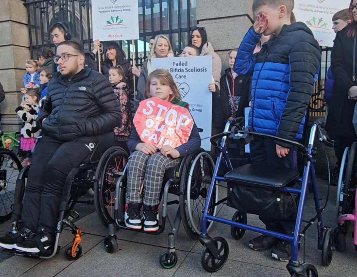 Spina Bifida & Hydrocephalus Paeds Advocacy#backus (@sbh_pag) on Twitter photo Feb 2024: <a href="/SBH_PAG/">Spina Bifida & Hydrocephalus Paeds Advocacy#backus</a> & <a href="/scolionetwork/">The Scoliosis Advocacy Network #BackUs</a> protested at the Dáil.
Our children begging Govt to pass a motion to end the suffering their suffering
FF & FG voted it down
The consequences have been grave
#JusticeForHarvey
The motion they ignored is here 📜 sl1nk.com/h38nh Feb 2024: <a href="/SBH_PAG/">Spina Bifida & Hydrocephalus Paeds Advocacy#backus</a> & <a href="/scolionetwork/">The Scoliosis Advocacy Network #BackUs</a> protested at the Dáil.
Our children begging Govt to pass a motion to end the suffering their suffering
FF & FG voted it down
The consequences have been grave
#JusticeForHarvey
The motion they ignored is here 📜 sl1nk.com/h38nh