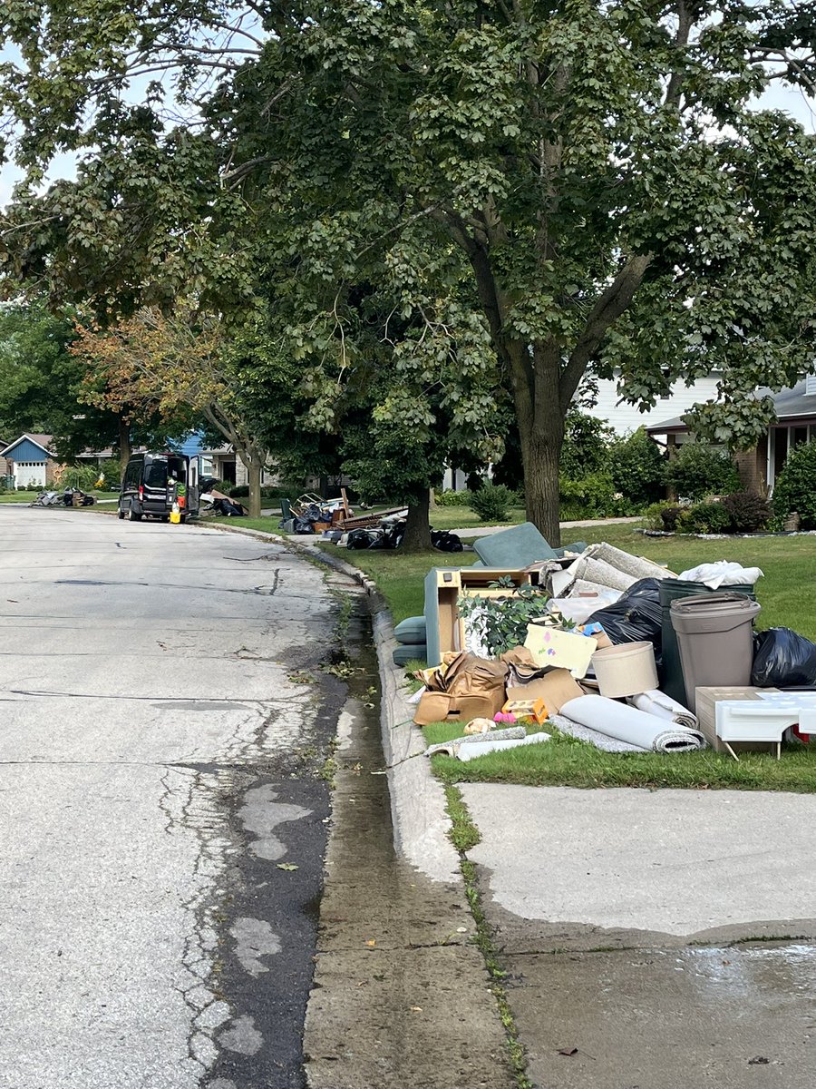 andrewtornado11's tweet image. Widespread flooding impacts in Milwaukee Co. First three videos/images are at the Whitnall Park Beer garden in Greendale, near the Root River. The shipping container was moved about 100 yards. Last photo shows what many streets around town look like. @NWSMilwaukee @BrianNizTMJ4
