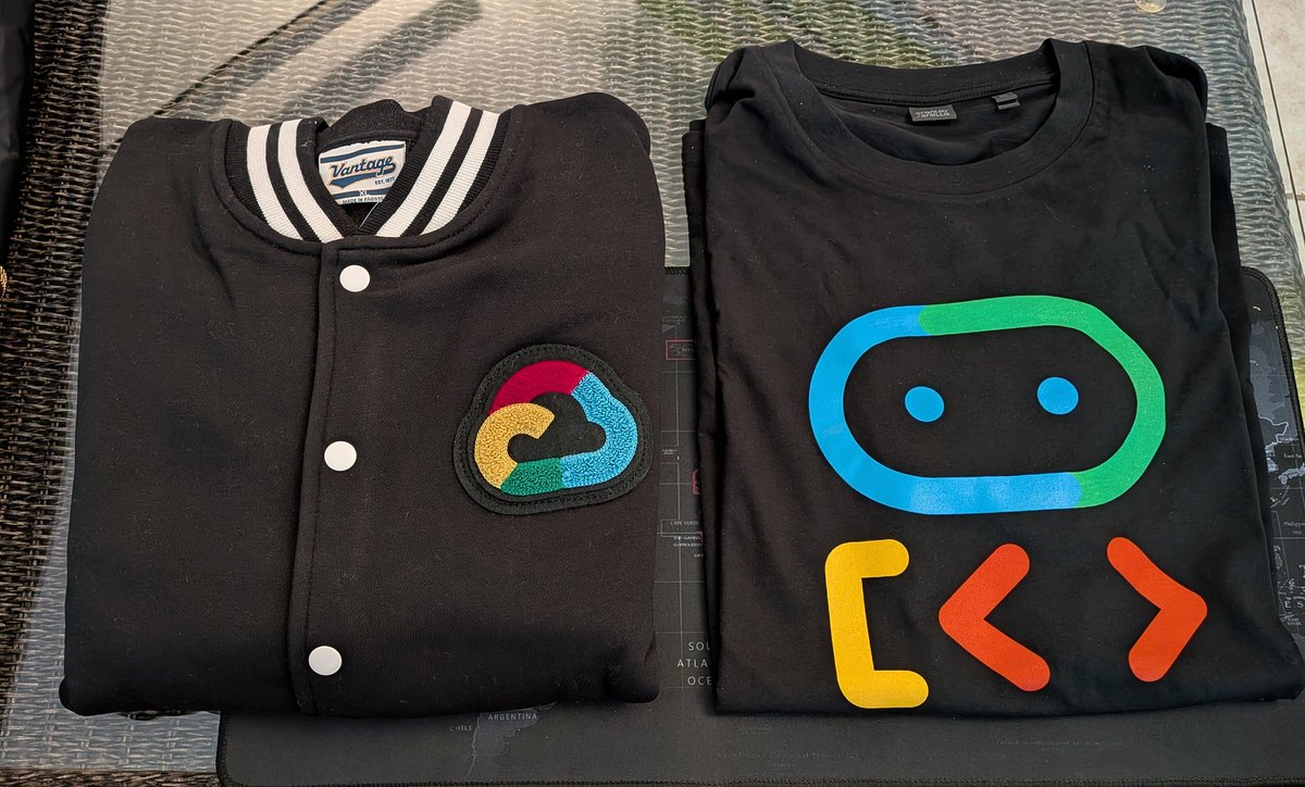 JKirstaetter's tweet image. Cool swag for #GoogleDeveloperExpert just dropped! 🤘
Big Thank you to Ronan, Janise, @_jkimani, @DeniseAllela and Monika for such cool stuff! Gonna rock that vintage college jacket at the upcoming Google Cloud Roadshow 2025 in Africa. If I'm able to hide from my teenagers. 😁