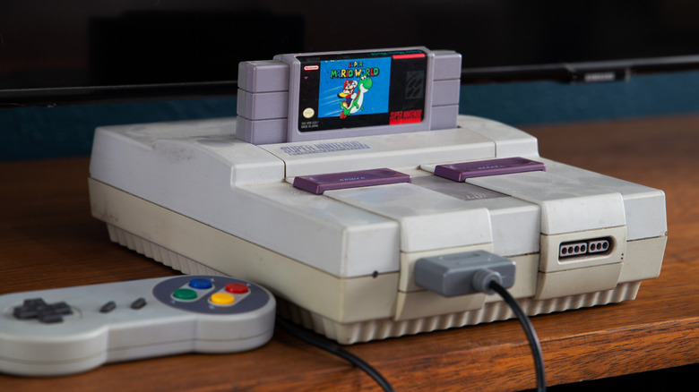 Retro365X's tweet photo. On 13th August 1991, the Super Nintendo launched in the USA — and 16-bit gaming levelled up.🎮✨ With Super Mario World, F-Zero, and Mode 7 magic, the SNES kicked off a golden age of gaming.

#SNES #SuperNintendo #16bit #RetroGaming #OnThisDay https://t.co/oWTIQEiawu