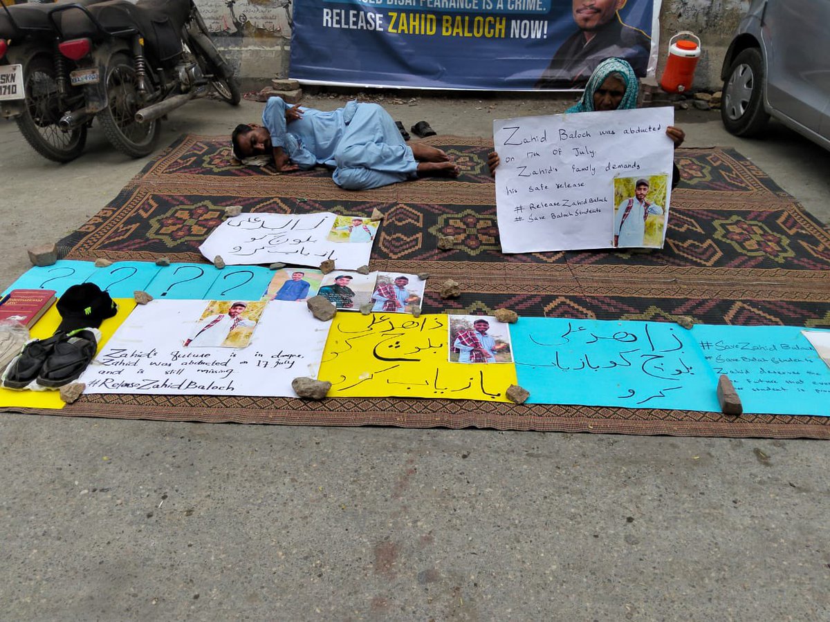BalochYakjehtiC's tweet photo. Today marks the ninth consecutive day of the protest camp by the family of Zahid Ali, a 25-year-old International Relations student at the University of Karachi, who was forcibly disappeared by Pakistani forces on 17th July 2025, along with his rickshaw that he drove part-time to support his family.

Led by his ailing father, Abdul Hameed—a hepatitis patient—the family continues to sit outside the Karachi Press Club, with a single demand: safe release of Zahid. 

It has now been 28 days since Zahid’s disappearance. Authorities remain silent, offering no answers and no justice. His case is one of countless enforced disappearances targeting Baloch youth in Karachi and Balochistan.

We call on students, activists, journalists, and all concerned citizens to join the camp, amplify the family’s voice, and demand justice.

#EndEnforcedDisappearances
#StopBalochGenocide