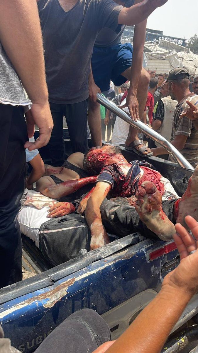 swilkinsonbc's tweet photo. A horrific israeli massacre targeting aid security personnel near Andalus Tower in al-Karama, northwest of Gaza City: dozens killed &amp; wounded https://t.co/q2QT96DMFO