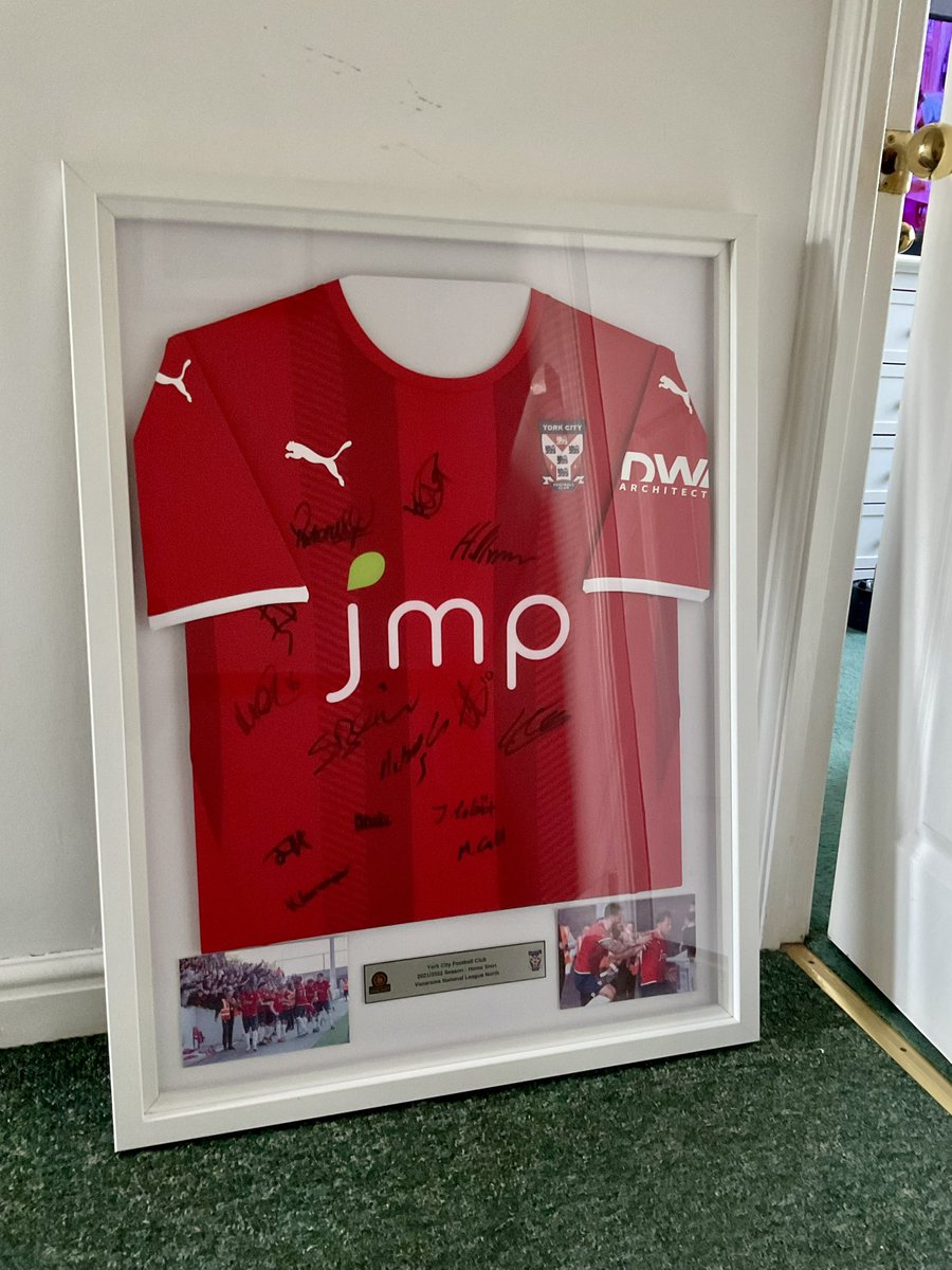 Will post on here ahead of eBay.

York City squad signed and framed home shirt #YCFC

2021/2022 National League North promotion season.

Frame size is 25x33 inch. Looking for £250.00.

DM if interested.