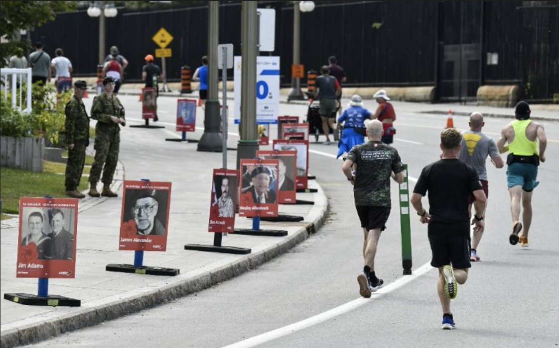 RoyalCdnLegion's tweet photo. In 2017, The Royal Canadian Legion launched Remembrance Row in partnership with @CanadaArmyRun  - a moving on-course feature that showcases photographs of Veterans who have passed. And every year since we have honoured the memory of Canada’s Veterans. Have you made a submission to Remembrance Row? Tell us in the comments.