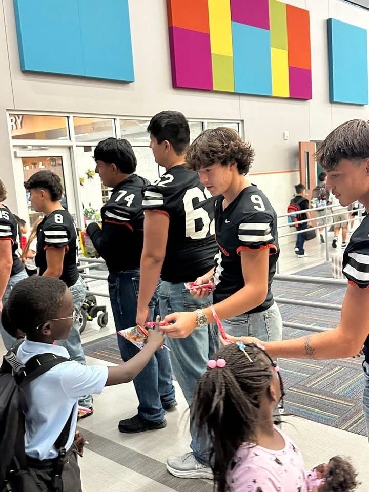 Demon Football out welcoming students back to the 1st day of school for the 2025- 2026 school year.  “Today is architect of your tomorrow.  Build it with intention”.  Go be great Dumas Independent School District.  #Accountability #Love #Toughness