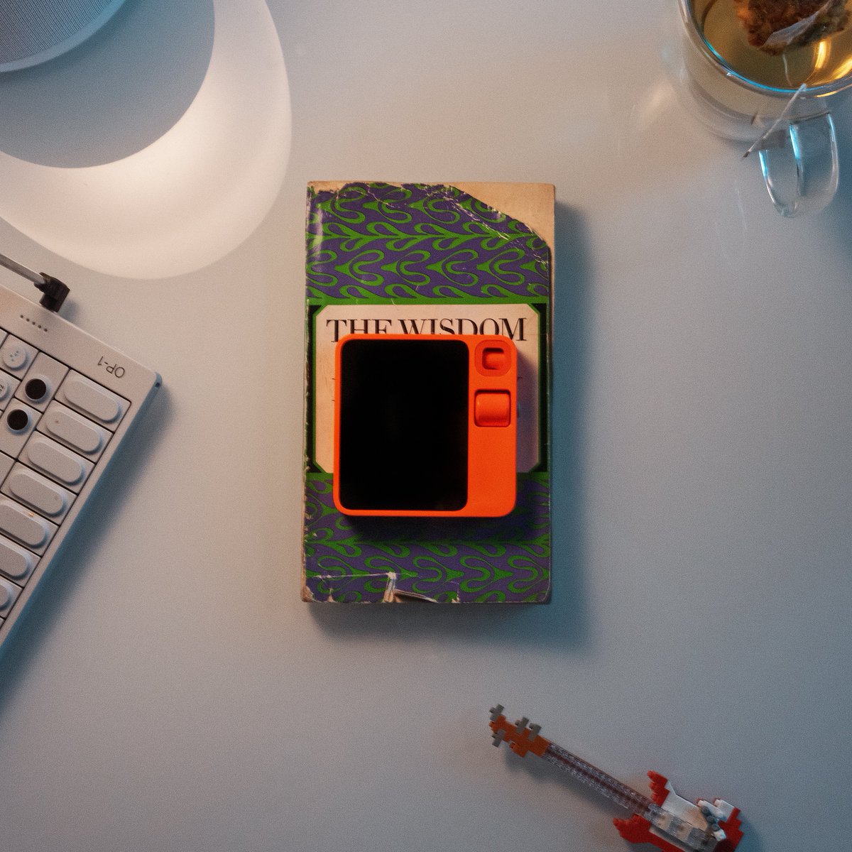 rabbit_hmi's tweet photo. want to take doom-scrolling out of your morning and evening routines? r1 can help 🟧 https://t.co/CbCWOqgIYR