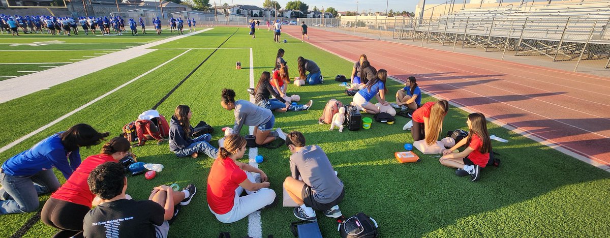 ahstrainers17's tweet photo. Day 3. Medical Prep, DONE! Student Athletic Trainers Aides &amp; ALL our football coaches practicing reviewing CPR and our @Coach_NoeRobles coaches completing CPR mock emergency drill! LETS GO!!  EMS : Preparing/practicing / implementing / better @BlazerNationAHS @Americas_HS https://t.co/w4wUH0nQwY