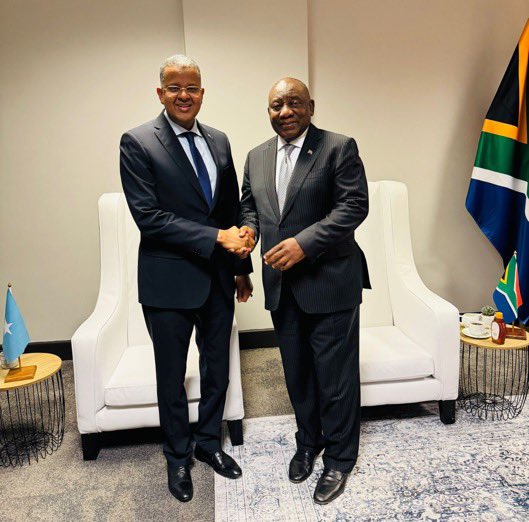 SomaliainZA's tweet photo. On the sidelines of the Africa Water Investment Summit in Cape Town, Somalia’s Deputy Prime Minister, H.E. @HonJibrilAHaji, held bilateral talks with the President of South Africa, H.E. Cyril Ramaphosa, in the presence of @Amb_msheikh. @DIRCO_ZA  @SomaliPM  @TheVillaSomalia https://t.co/aXVHlln1q3