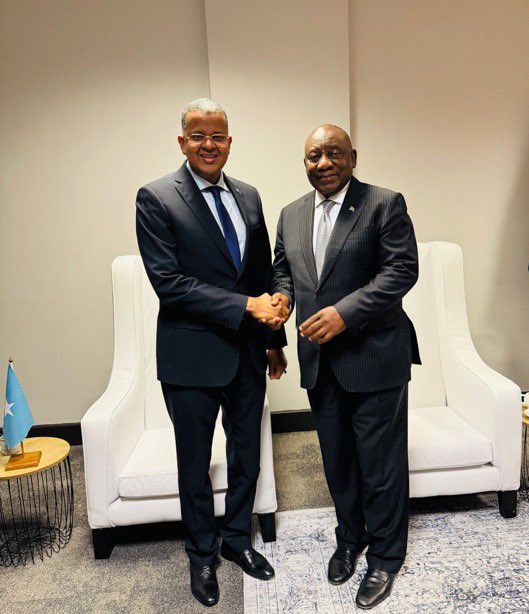 SomaliainZA's tweet photo. On the sidelines of the Africa Water Investment Summit in Cape Town, Somalia’s Deputy Prime Minister, H.E. @HonJibrilAHaji, held bilateral talks with the President of South Africa, H.E. Cyril Ramaphosa, in the presence of @Amb_msheikh. @DIRCO_ZA  @SomaliPM  @TheVillaSomalia https://t.co/aXVHlln1q3