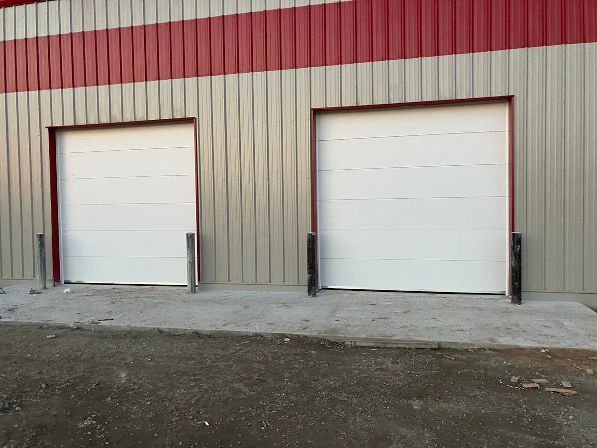 Insulation, interior framing, and overhead doors galore! 🤩 

The Emergency Services Building project in Nelson House was a lot of fun, and it's always great to work on projects that support their community! 💓