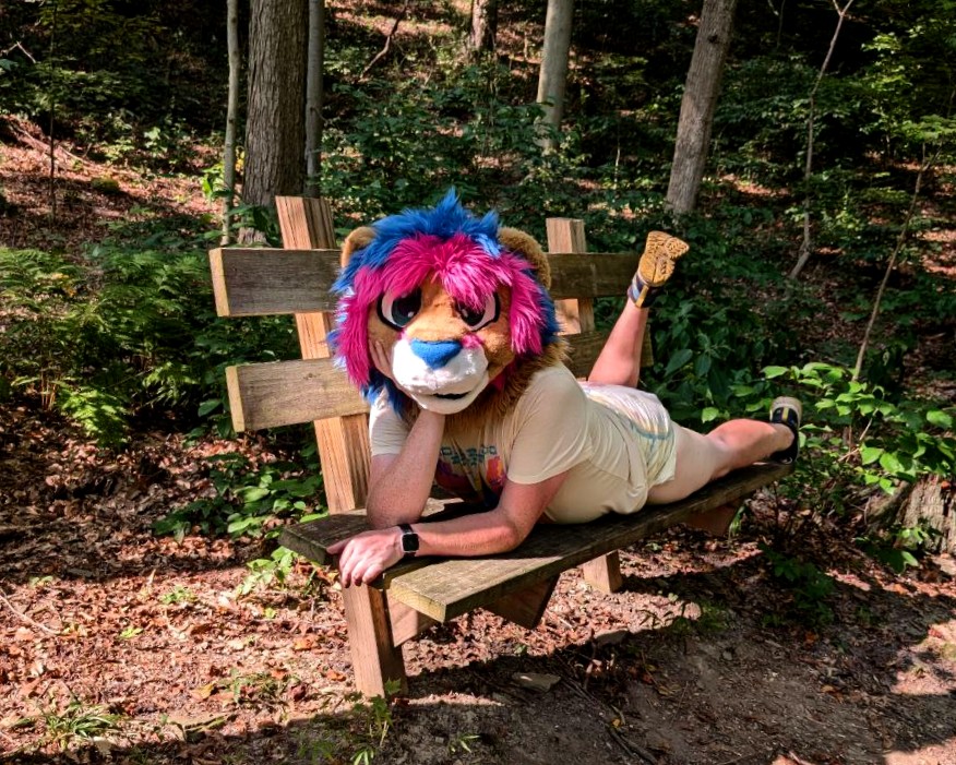 Pack your diaper bag, we're hitting the trail! 

Taking advantage of the woods in my area.

📸 @puppocino.bsky.social 
#abdl #diaper #babyfur #fursuit