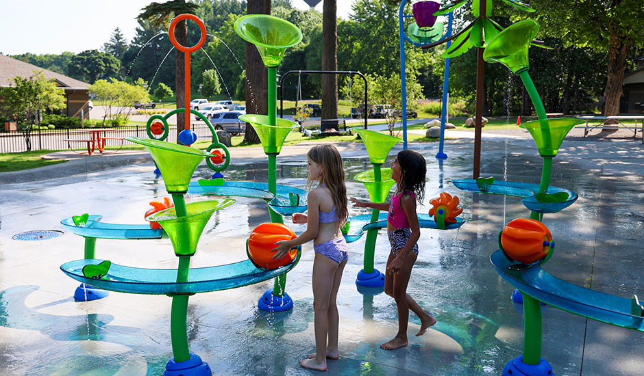 Brownson Memorial Park is open with new improvements, including an updated splash pad, playground, ADA-friendly structures, and outdoor fitness stations. Read about the project and Wade Trim's involvement at wadetrim.com/kingsley-brown….