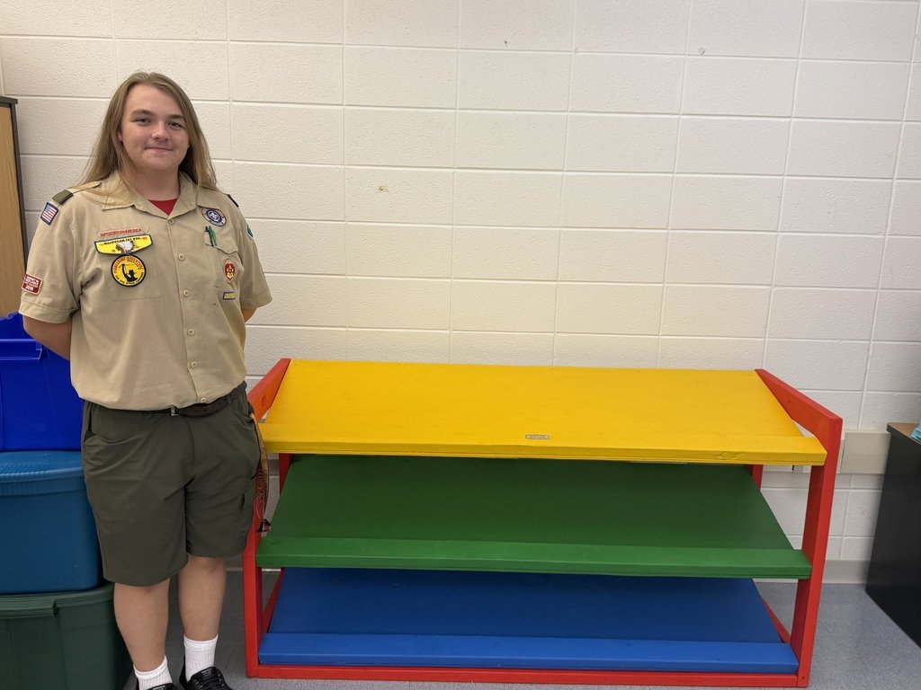ManhattanSD114's tweet photo. Many thanks to Aidan Casey, former Manhattan 114 student, for serving our district through his Eagle Scout project. Aidan built a custom shelf to store instruments for Mrs. Miller-Amato's music classroom at Wilson Creek.  Congratulations and thank you, Aidan! https://t.co/xKw0QNMUUx