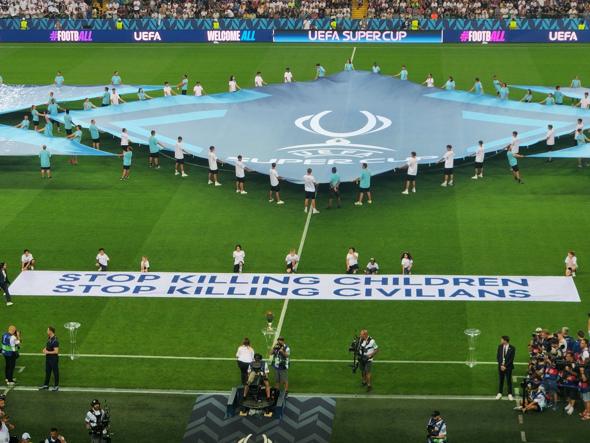 Footballtweet's tweet image. "STOP KILLING CHILDREN - STOP KILLING CIVILIANS." 🕊

UEFA sends a clear message before the UEFA Super Cup.