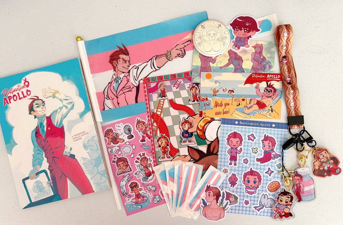 got my contributor’s bundle from <a href="/transapollozine/">Destination: Apollo, a Transpollo Zine</a> !!! I’m so honored to have been able to participate in this zine!! 😭‼️🩵🩷🤍🏳️‍⚧️💕