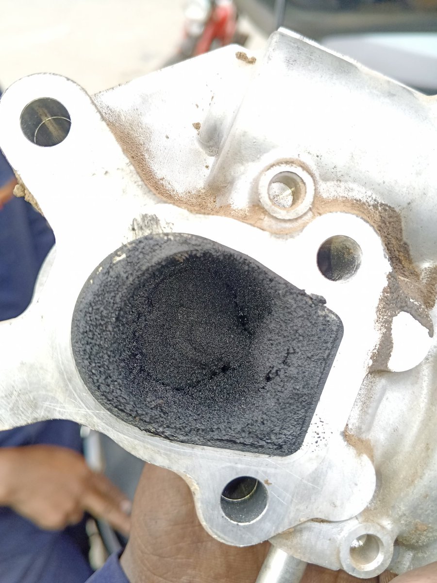 Pre-purchase inspection Mazda CX-5 Follow-up minor service at Waterfront Karen,Upgraded the coolant junction pipe to a metallic version for longevity. During the process, we identified a clogged EGR valve, which can restrict exhaust gas flow &amp; reduce engine efficiency <a href="/carsureke/">carsure</a>