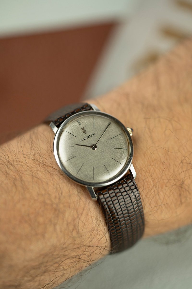 This Corum watch is the epitome of a stylish dress watch. A silver linen dial, 6mm of thickness, this is probably one of the best values out there. Available on the site now.