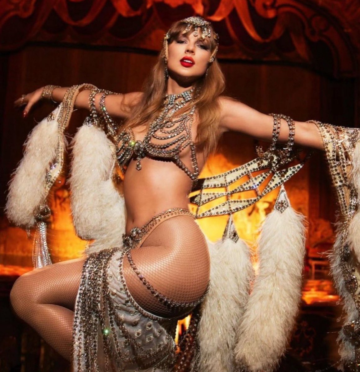 OG swifties look at this in shock that taylor is revealing her belly button, reminiscing on the days we joked that she didn’t have one 😂