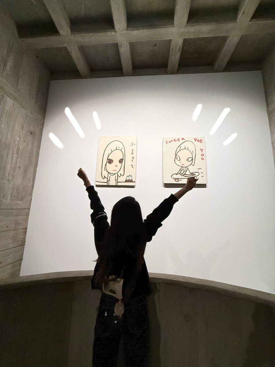 Lost in the art, feeling the vibrant energy of the space.  🙌