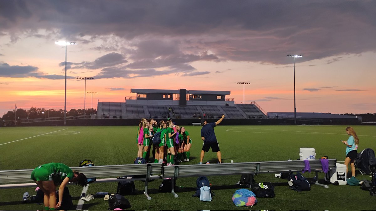 Lady Warhawks take advantage of the backdrop.