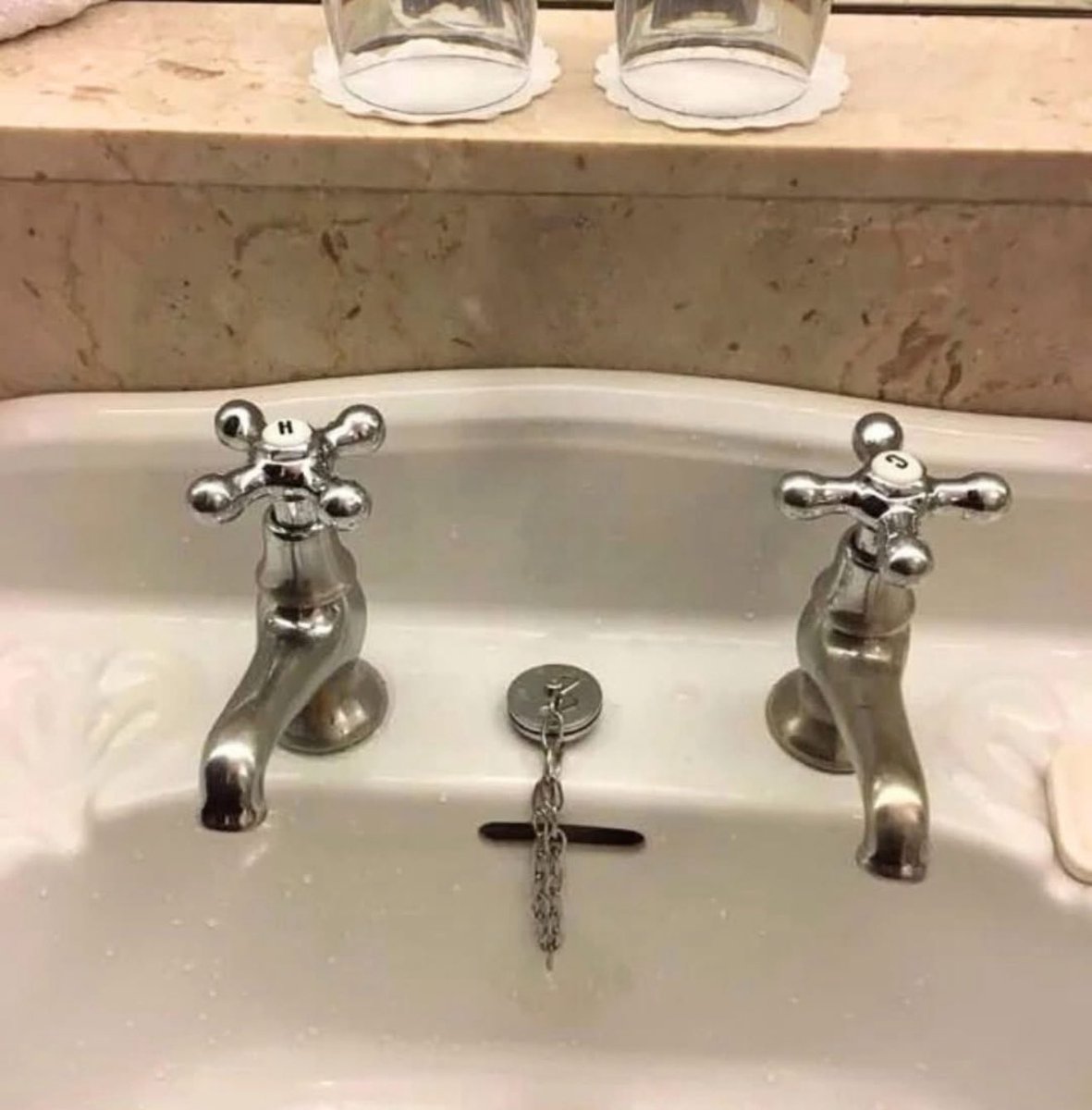 At first this seems quaint, like an artistic choice - charming even - but when you see that most of England has separate hot and cold taps, you really think WTF.