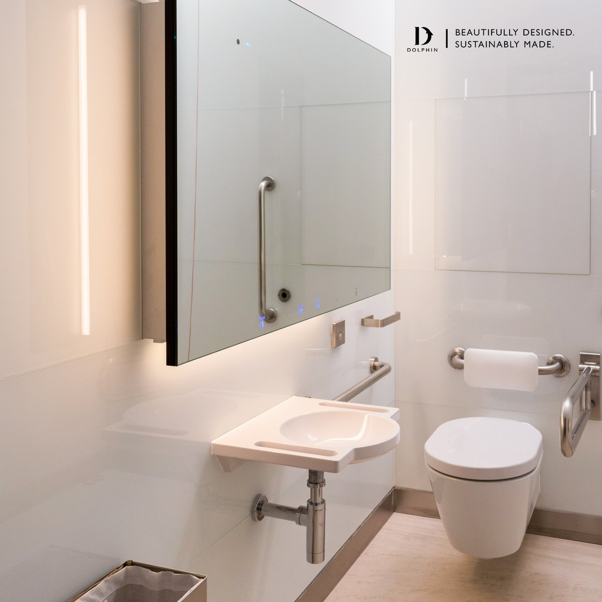Bring everything together in one sleek behind mirror system.

This accessible washroom swaps the traditional separate tap, soap dispenser, and hand dryer for the Dolphin Alavo Mirror System.

Sometimes, the most modern approach is the simplest one.

🔗 eu1.hubs.ly/H0mh6mj0