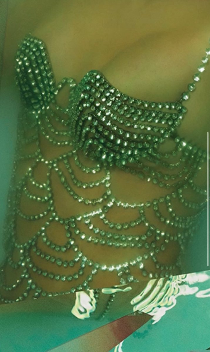 nola_swiftie's tweet photo. The scallop rhinestones mirror the midnights bodysuit. Since this was often the outfit she left the stadium in, and ran right to hotel her room to recover. 
#tsthelifeofashowgirl https://t.co/T6T5Zj4Iwq