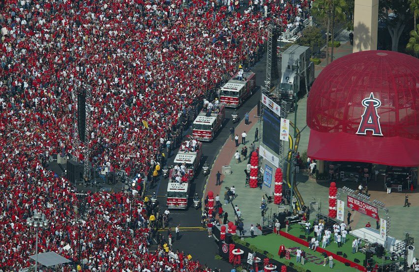 D1SCHER's tweet photo. I am boots on the ground here in Anaheim 

The parade has commenced

We just season sweeped the dodgers https://t.co/WVY2kcc588