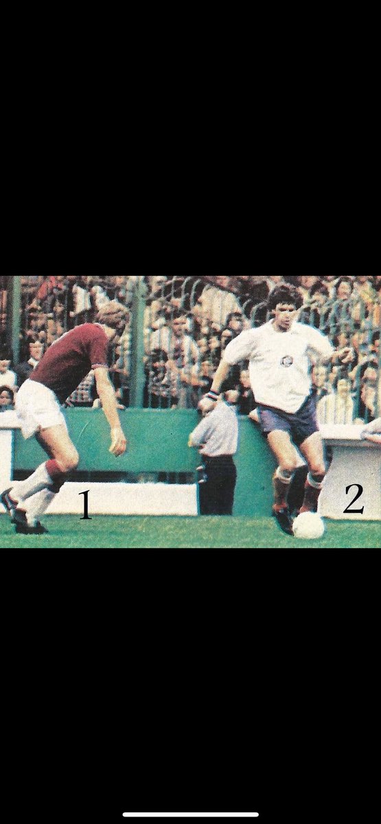 ⁦<a href="/michael_kierans/">Michael Kierans7</a>⁩ ⁦<a href="/WillieMorganMBE/">Willie Morgan MBE</a>⁩ In action at Turf Moor for Bolton, taking on Jim Thompson.