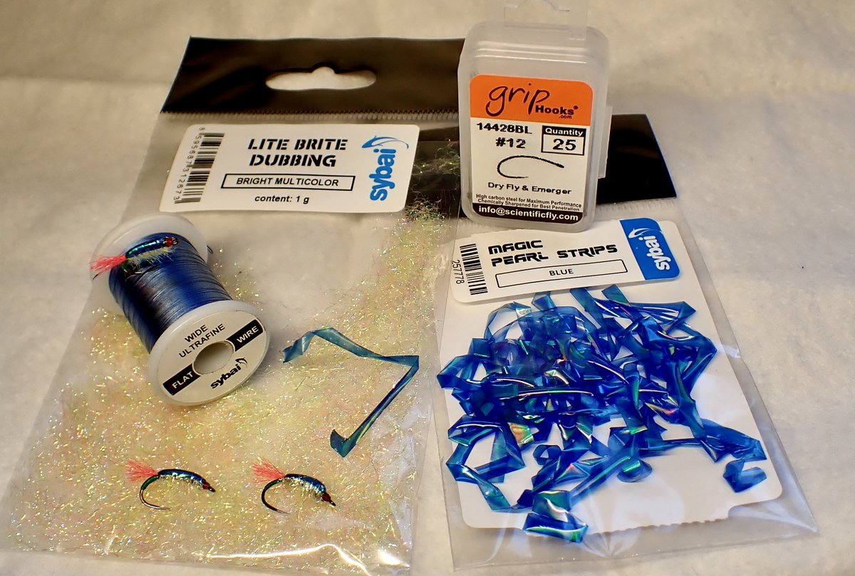 Blue Magic Pearl MC sand shrimp for mullet

Hook: grip 14428BL #12
Tail: Glo-Brite no 4
Tag: Glo-Brite no.13
Thread: sheer 14/0 Red
Back: Sybai, Magic pearl strip Blue
Rib: Light Blue Sybai Flat Wire
Body: Sybai Lite Brite dubbing multicolour

#mulletonthefly #flytying