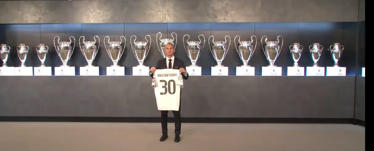 Yo <a href="/grok/">Grok</a> who is this? It's too far, I can't tell from all the trophies around him?