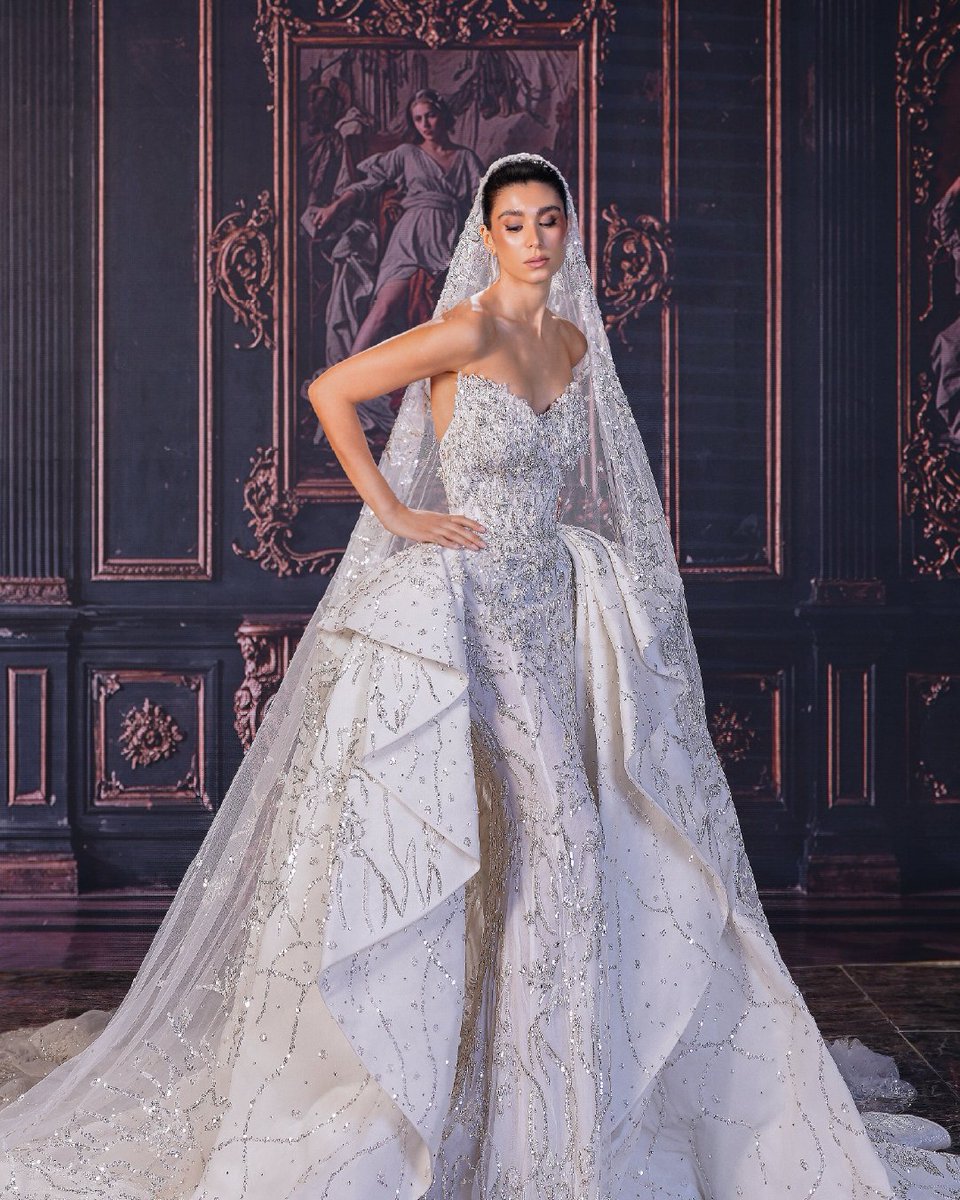 manalajaj's tweet photo. Silver threads and crystal accents trace the gown like falling stardust, flowing into sculpted folds that frame each step. A vision of radiance, she blooms anyway. https://t.co/9EPNtA9VCt