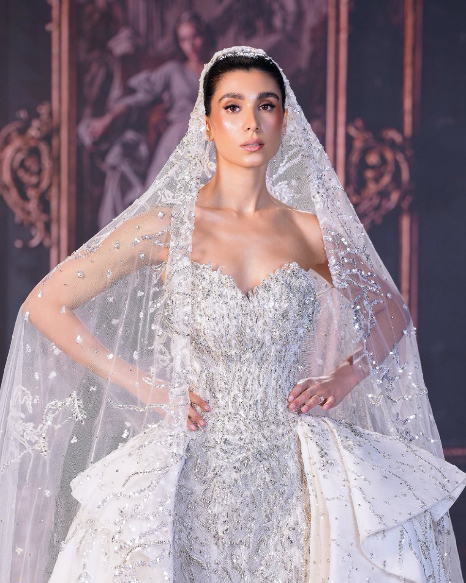 manalajaj's tweet photo. Silver threads and crystal accents trace the gown like falling stardust, flowing into sculpted folds that frame each step. A vision of radiance, she blooms anyway. https://t.co/9EPNtA9VCt