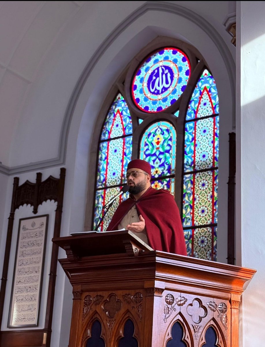 an imam giving sermon at the podium of a church transformed into a mosque ❤️