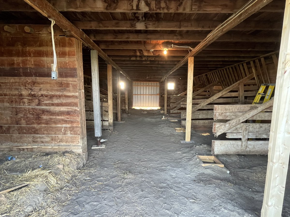 After 115 years, it’s time for the old barn to receive some additional structural support, while leaving the tie stalls intact as a tribute to the past. Replacing rocks with concrete under the supporting posts. Hope it stands for another 100!