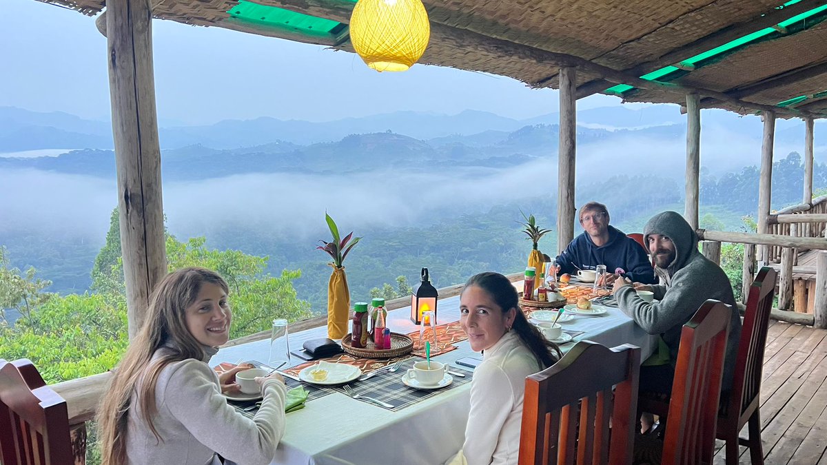 AHabinyanjja's tweet photo. Happiness is best served with mountain views and good company. Eyes wide, hearts full. From the misty mornings to golden sunsets — this is why we travel. 💚🦍
 
#NeckViewLodge  #BwindiMagic #NeckViewAdventures #eveningbite ☕️ https://t.co/CFAF462gOE