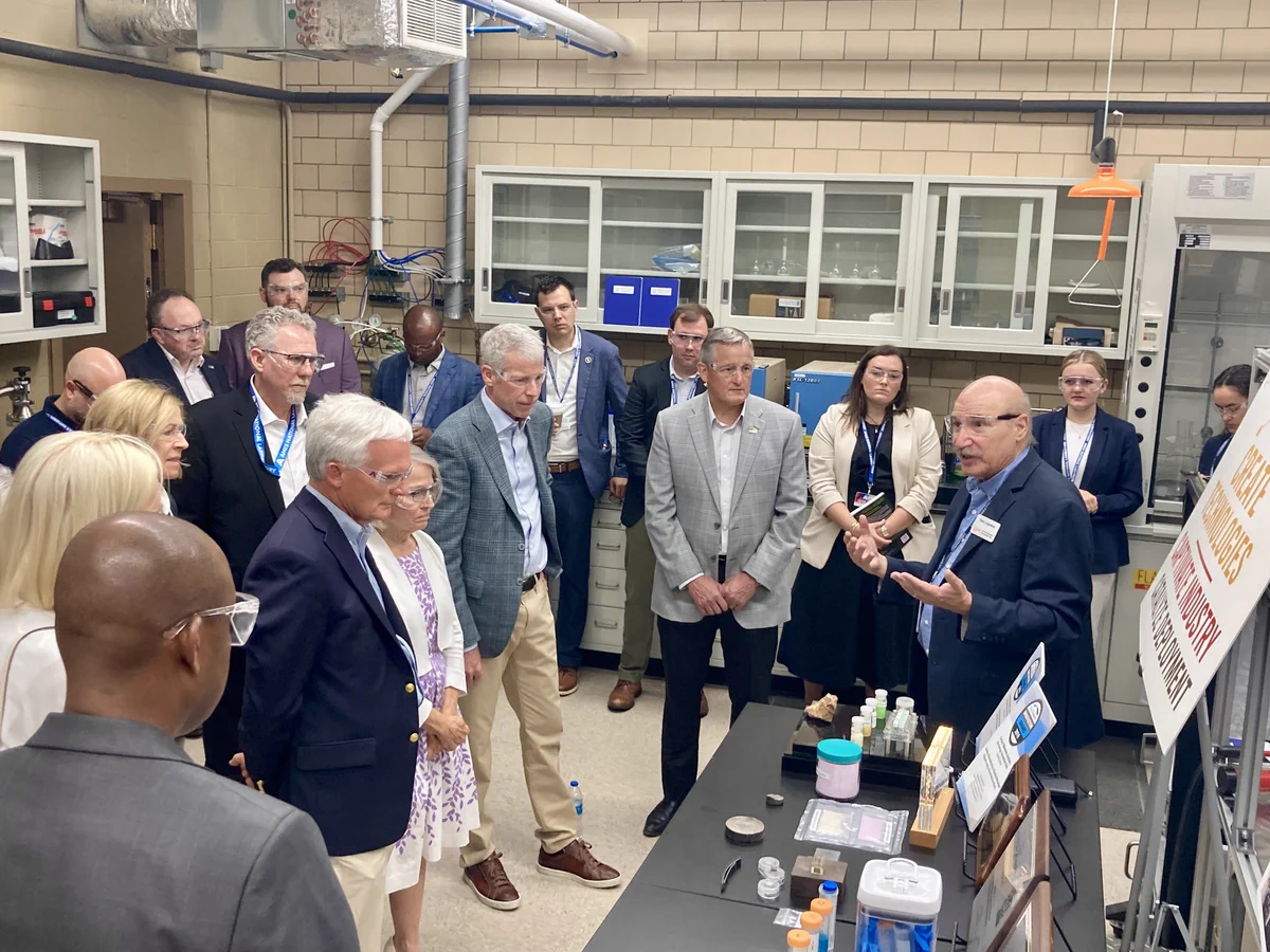 Tom Lograsso leads a discussion on rare earth recycling with Secretary Wright and guests. 