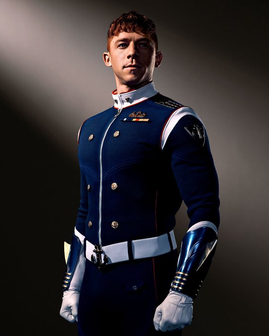 Will Hochman as Torpedo in Vought Rising. His outfit is all blue and looks very much like a naval officers’ would